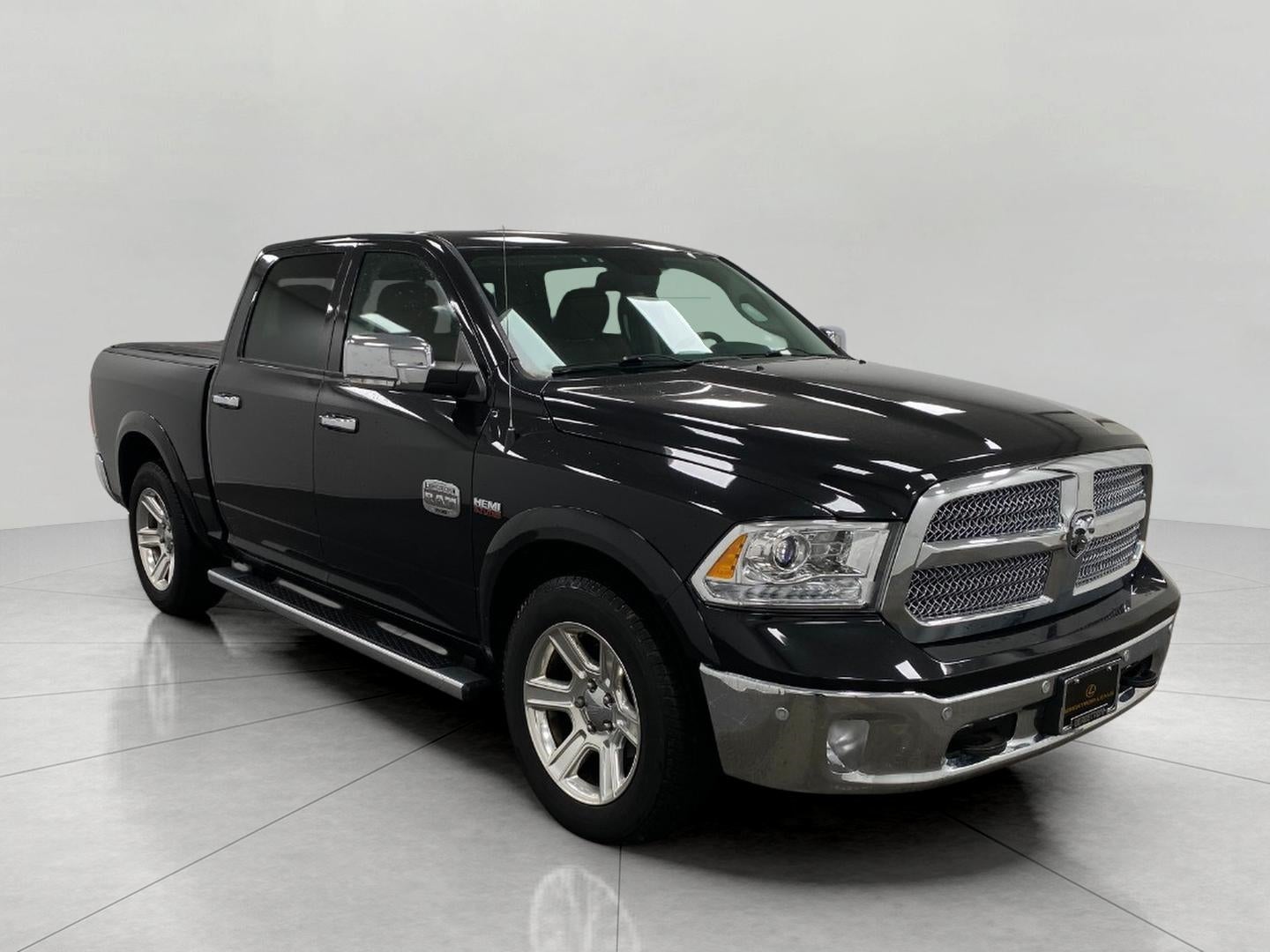 2015 RAM 1500 4WD Crew Cab 140.5 Laramie Longhorn