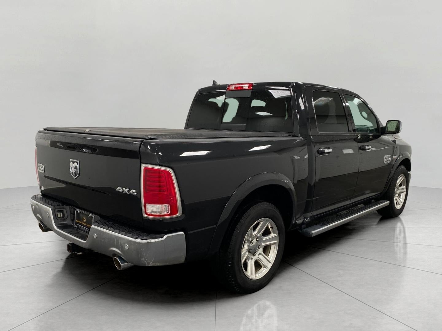 2015 RAM 1500 4WD Crew Cab 140.5 Laramie Longhorn