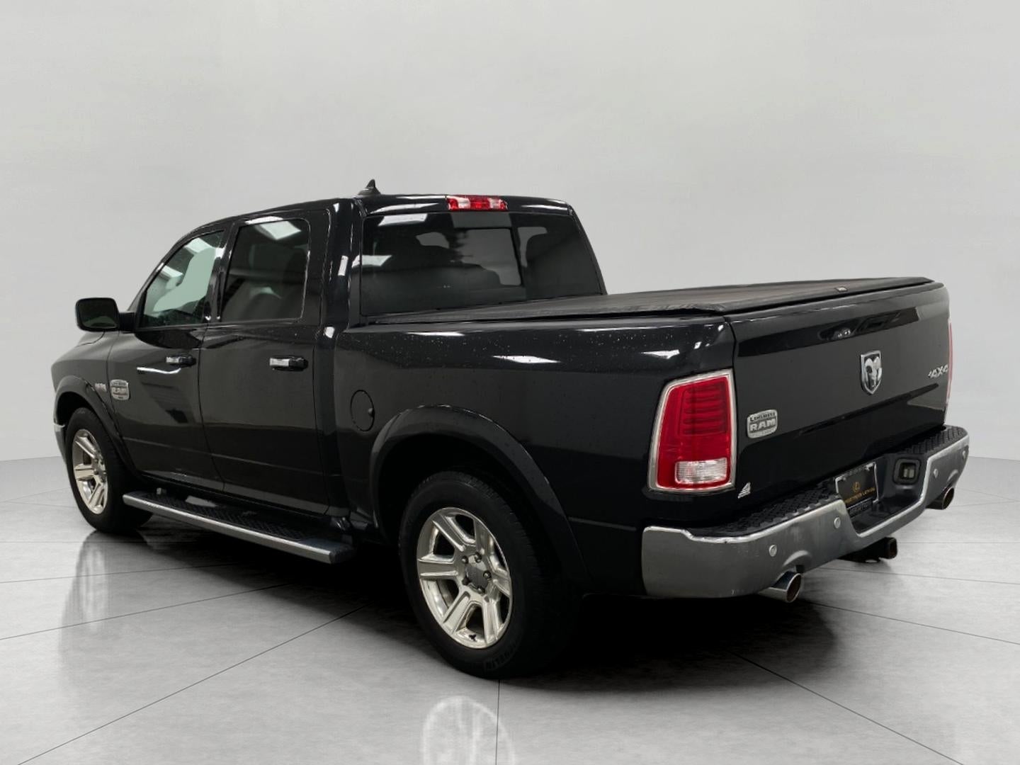 2015 RAM 1500 4WD Crew Cab 140.5 Laramie Longhorn