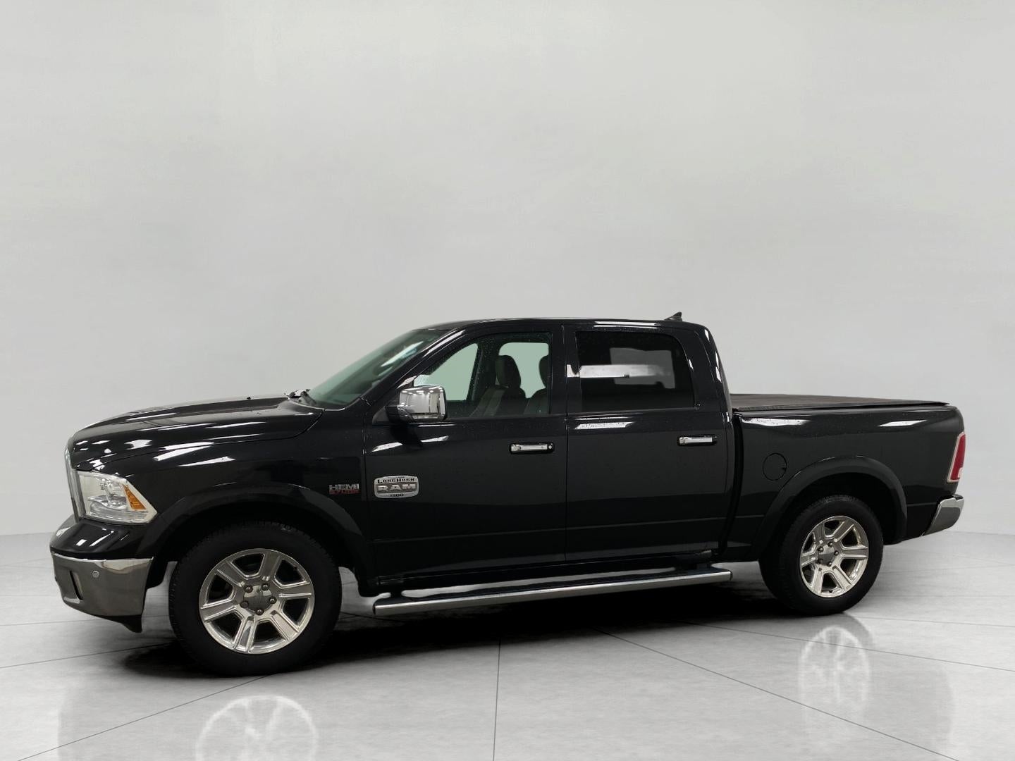 2015 RAM 1500 4WD Crew Cab 140.5 Laramie Longhorn